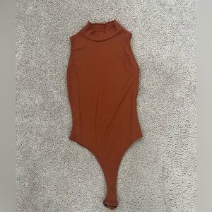 Nasty Gal Rust One Piece with Ruffle Neck